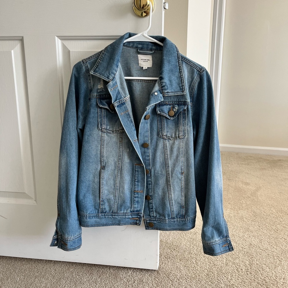 Women’s Distressed jean jacket size small.